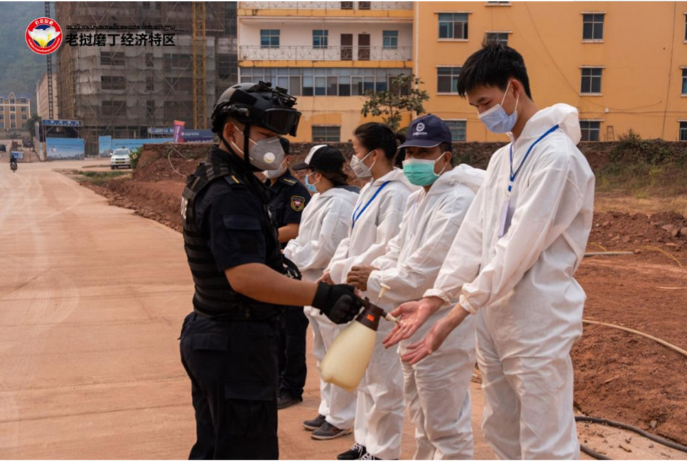 助力老挝北部发展,磨丁集团受乌多姆赛省表彰,获老挝国家奖